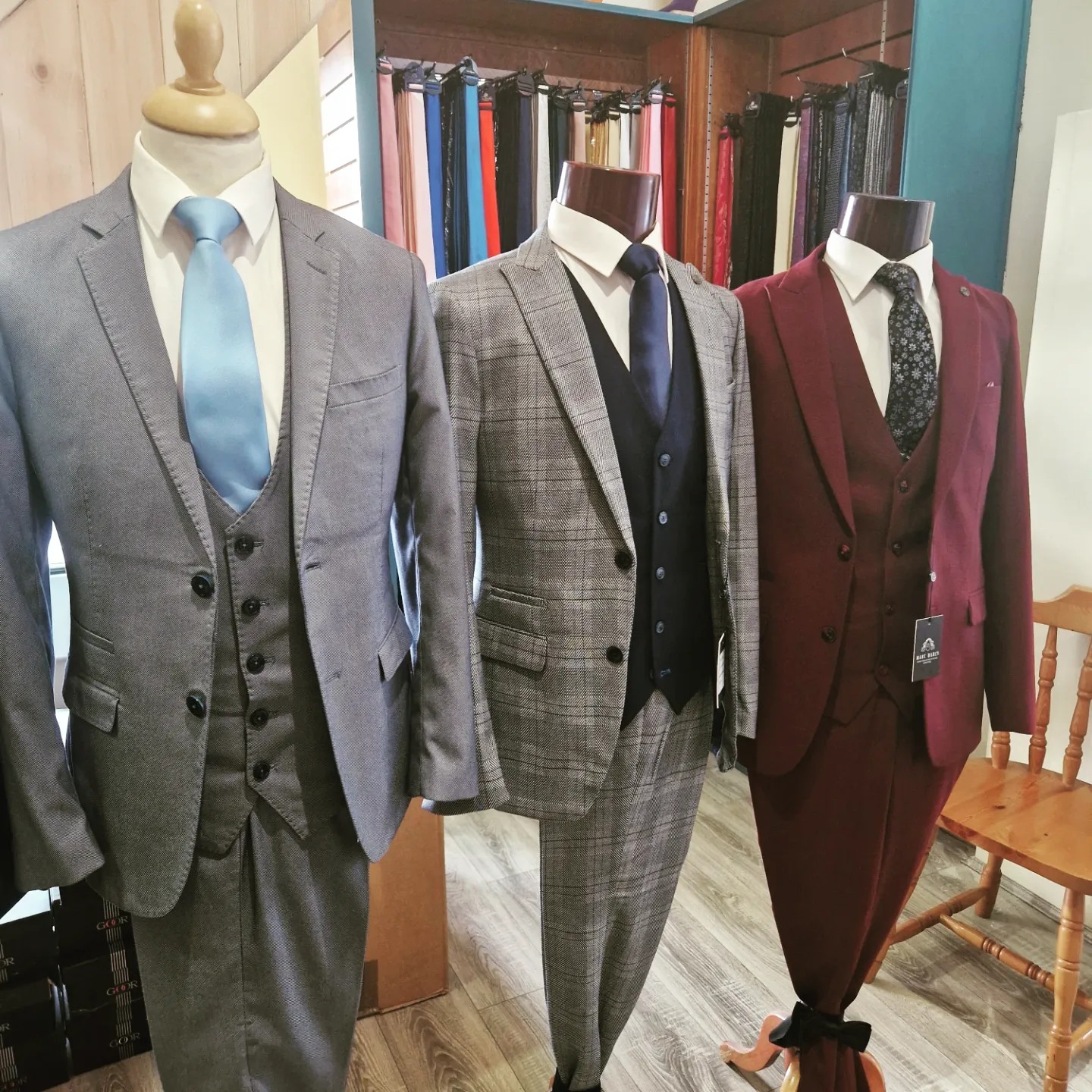 Three occasion suits on display in the All Suits store
