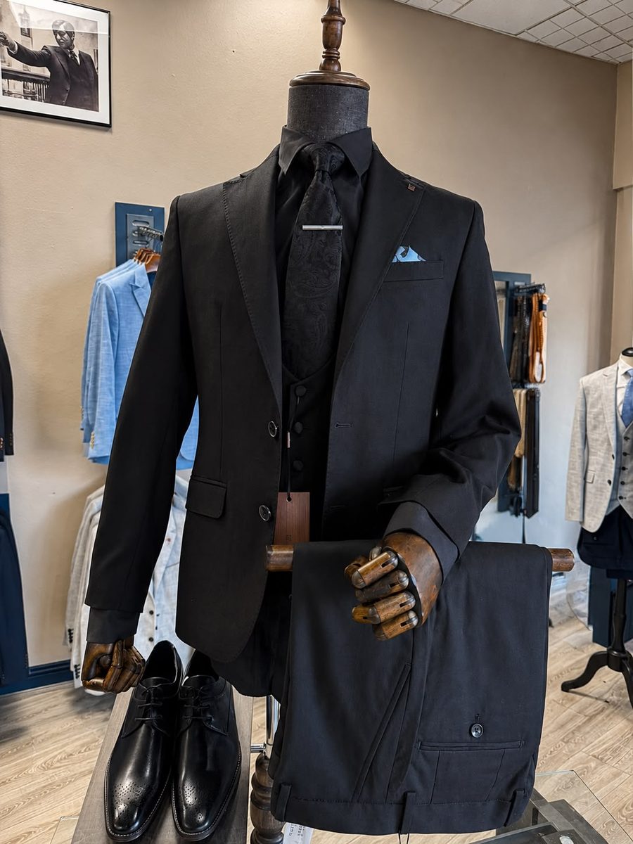 All-black suit, shirt and tie styled in the All Suits store